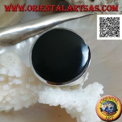 Silver ring with large flat round onyx on a smooth frame slightly concave on the sides