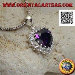 Silver pendant with amethyst colored zircon with a heart set surrounded by white zircons