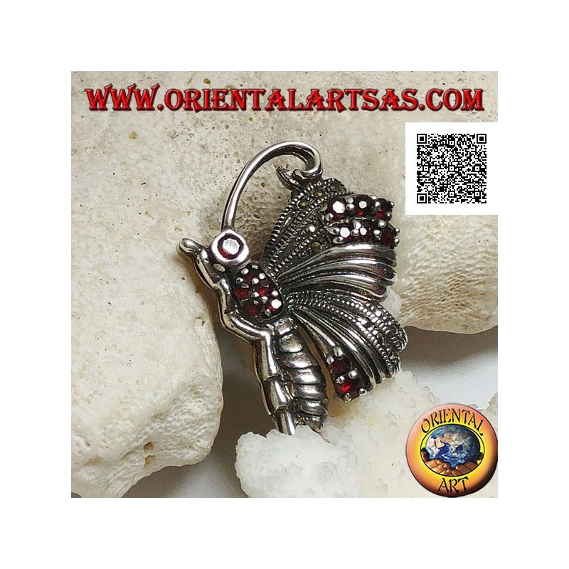 Silver brooch in the shape of a butterfly in profile studded with marcasite and garnets