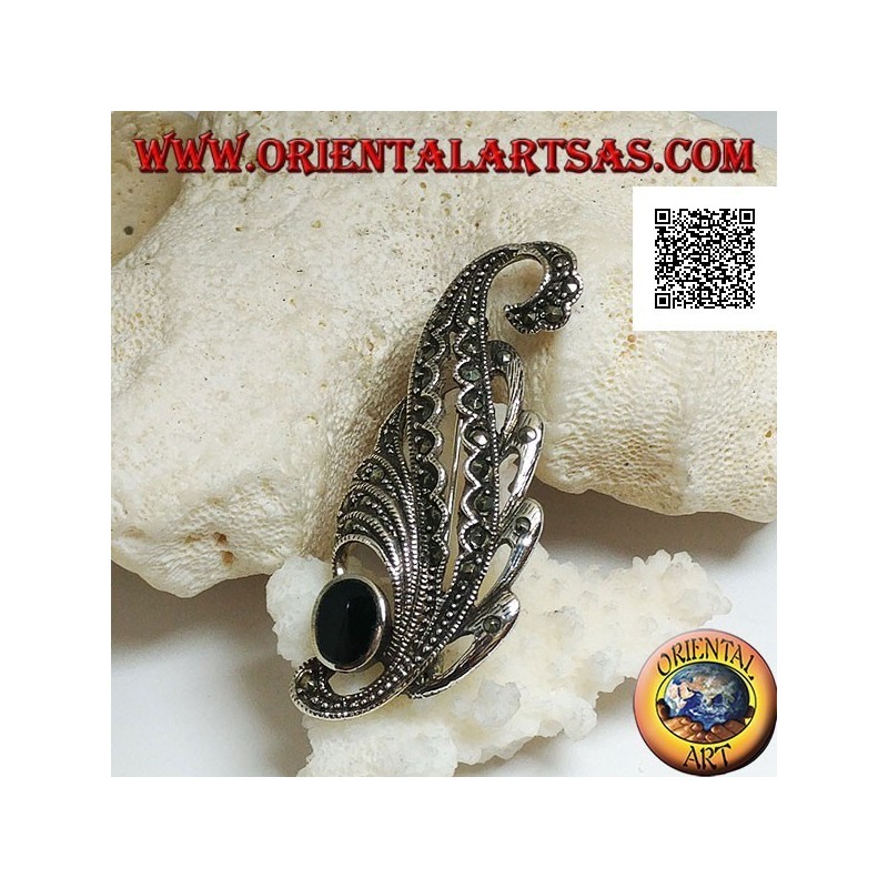 Broche de plata con forma de hoja tachonada de marcasita y ónice ovalado