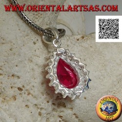 Silver pendant with drop-shaped ruby-colored zircon surrounded by white zircons