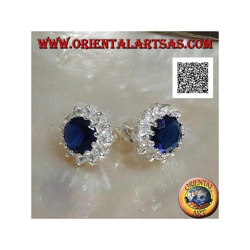 Silver earrings with round sapphire-colored zircon surrounded by white zircons