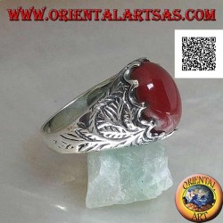 Silver ring with oval cabochon carnelian set and engraved decorations on the sides