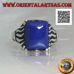 Silver ring with rectangular sodalite set in a cabochon with lines engraved on the sides