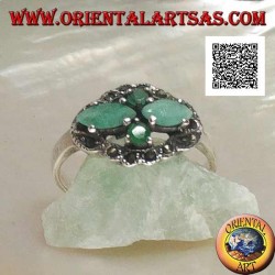 Silver ring with crossed cross pairs of natural shuttle emeralds and round ones surrounded by marcasite