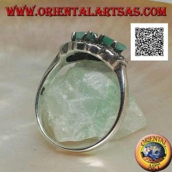Anillo de plata con pares cruzados cruzados de esmeraldas naturales y redondas rodeadas de marcasita