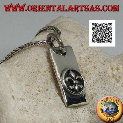 Silver pendant, thick rectangular plate with lily, heraldic figure, in high relief in a circle