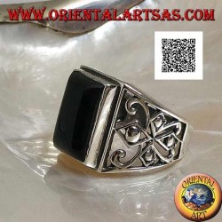Silver ring with rectangular onyx cabochon and openwork decoration on the sides