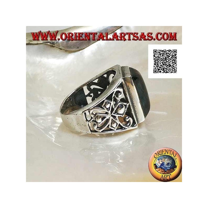 Silver ring with rectangular onyx cabochon and openwork decoration on the sides