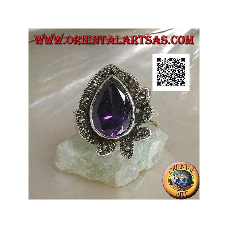 Silberring mit einem großen Tropfen amethystfarbenen Zirkon, umgeben von mit Markasit besetzten Blättern