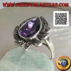 Bague en argent avec gros zircon couleur améthyste entouré de feuilles cloutées de marcassite