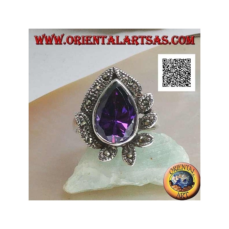 Silver ring with large drop amethyst colored zircon surrounded by leaves studded with marcasite