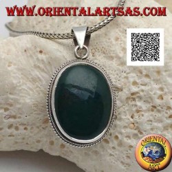 Silver pendant with green hematite or oval blood stone surrounded by a thin weave