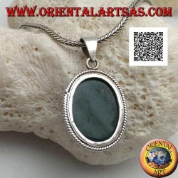 Silver pendant with green hematite or oval blood stone surrounded by a thin weave