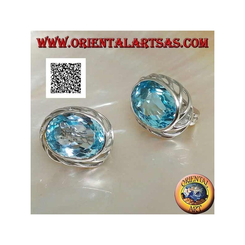 Silver lobe earrings with blue oval topaz on with openwork weave on the sides and lever closure