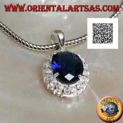 Silver pendant with oval sapphire zircon set surrounded by white zircons
