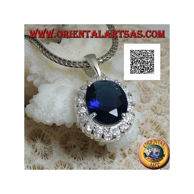 Ciondolo in argento con zircone color zaffiro ovale incastonato contornato da zirconi bianchi