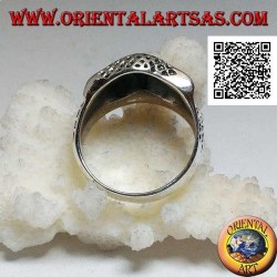 Silver ring in the shape of an owl head with eyes decorated with carvings