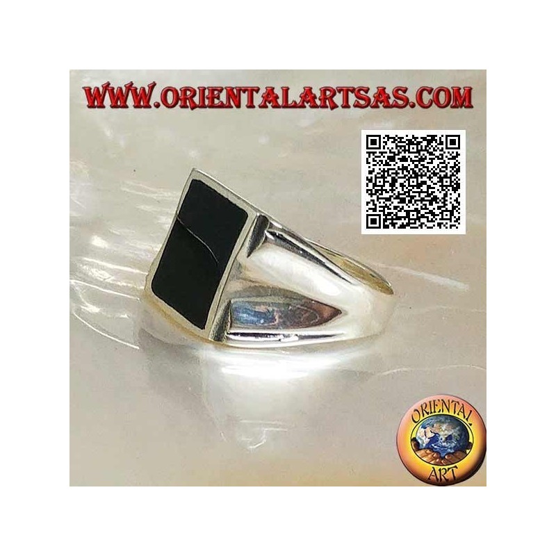 Silver ring with rectangular onyx on a smooth frame with central hollow on the sides