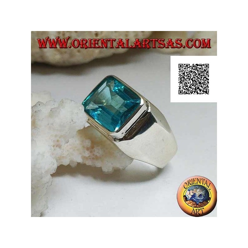 Silver ring with rectangular horizontal blue topaz raised on a smooth frame
