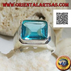 Silver ring with rectangular horizontal blue topaz raised on a smooth frame