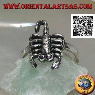 Silver ring with scorpion in an offensive position
