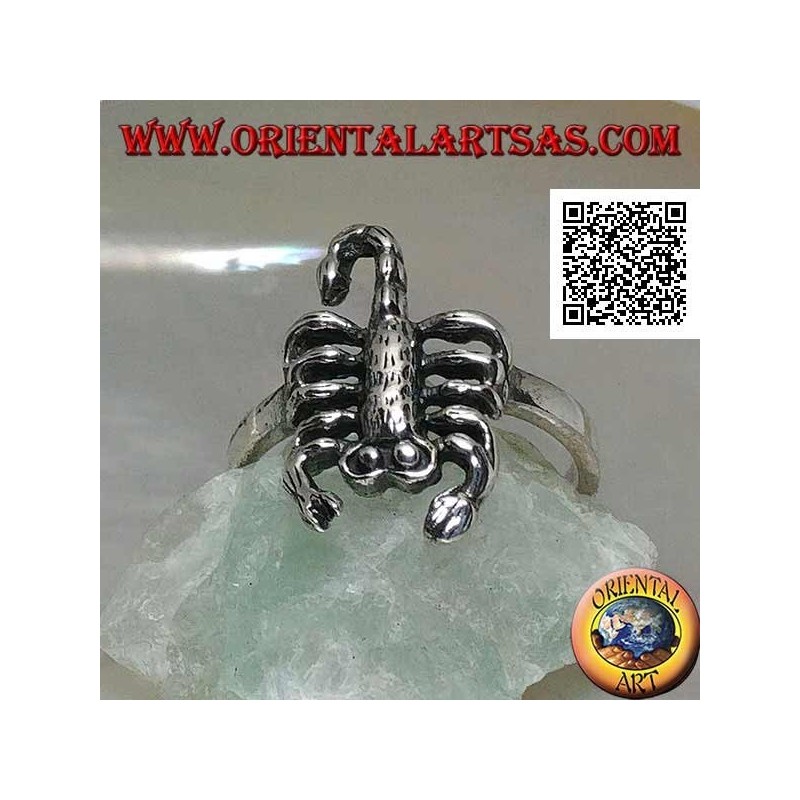 Silver ring with scorpion in an offensive position