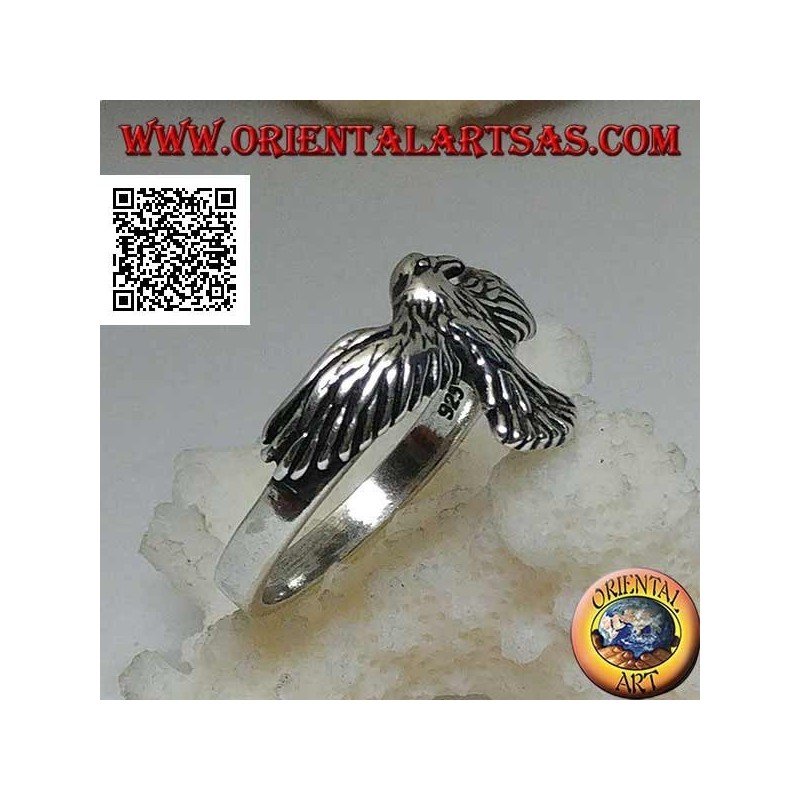 Silver ring with phoenix with spread and spread wings in flight