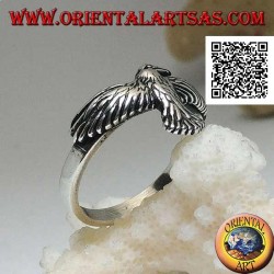 Silver ring with phoenix with spread and spread wings in flight