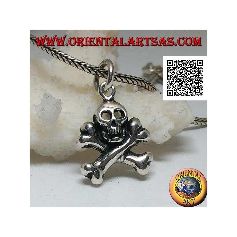 Silver skull pendant with two crossed femoral bones underneath