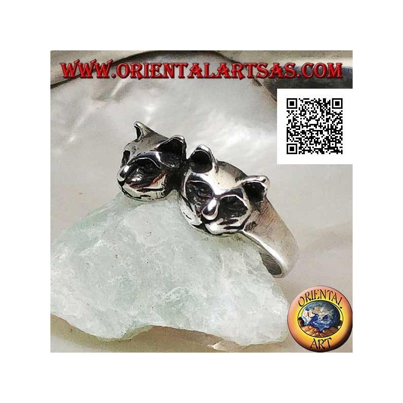 Silver ring with a pair of cats (heads)