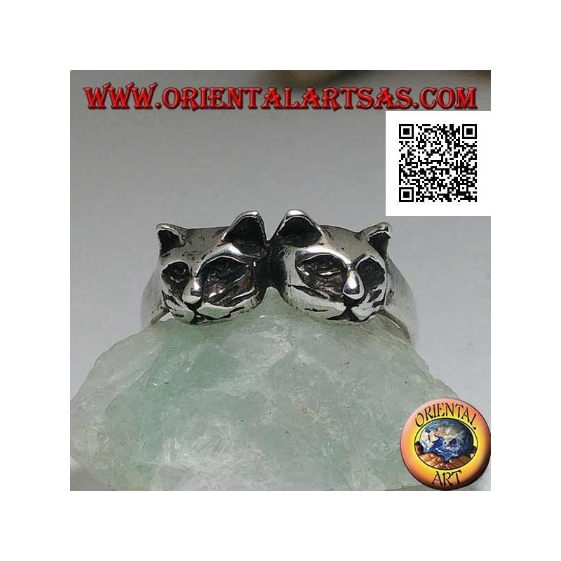 Silver ring with a pair of cats (heads)