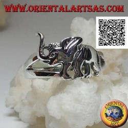 Silver ring with walking Asian elephant and trunk up