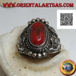 Silver ring with ancient Tibetan coral on Nepalese setting with Garuḍa (progenitor god of birds) on the sides