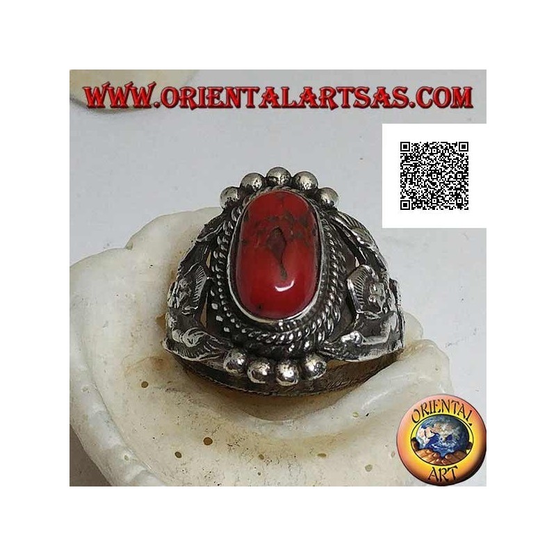 Silver ring with ancient Tibetan coral on Nepalese setting with Garuḍa (progenitor god of birds) on the sides