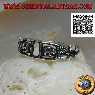 Silver ring composed of two stretched skeletons joined by the arms