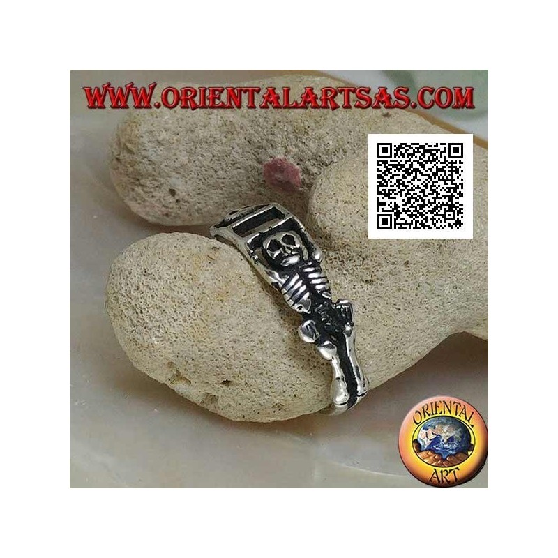 Silver ring composed of two stretched skeletons joined by the arms