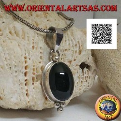 Silver pendant with oval cabochon onyx on smooth setting and three balls below