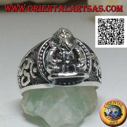 Silver ring with seated Ganesh in high relief with Oṃ (ॐ) on the sides