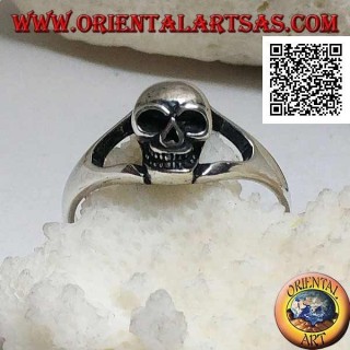 Simple silver ring with small protruding skull