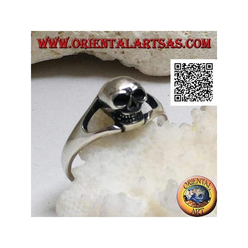 Simple silver ring with small protruding skull