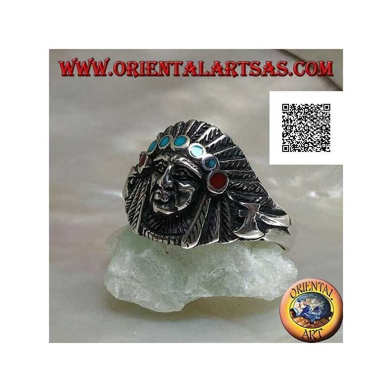 Anillo de plata, cabeza de indio americano con tocado de plumas y discos de turquesa y coral