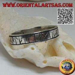 Silver ring with engraved Celtic runes