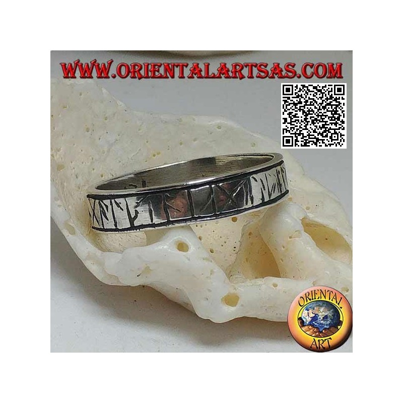 Silver ring with engraved Celtic runes