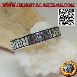 Silver ring with engraved Celtic runes