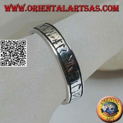 Silver ring with engraved Celtic runes