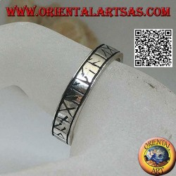 Silver ring with engraved Celtic runes