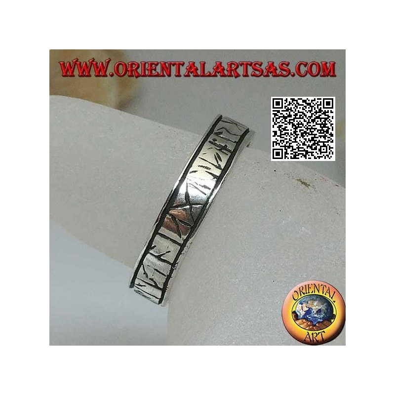 Silver ring with engraved Celtic runes