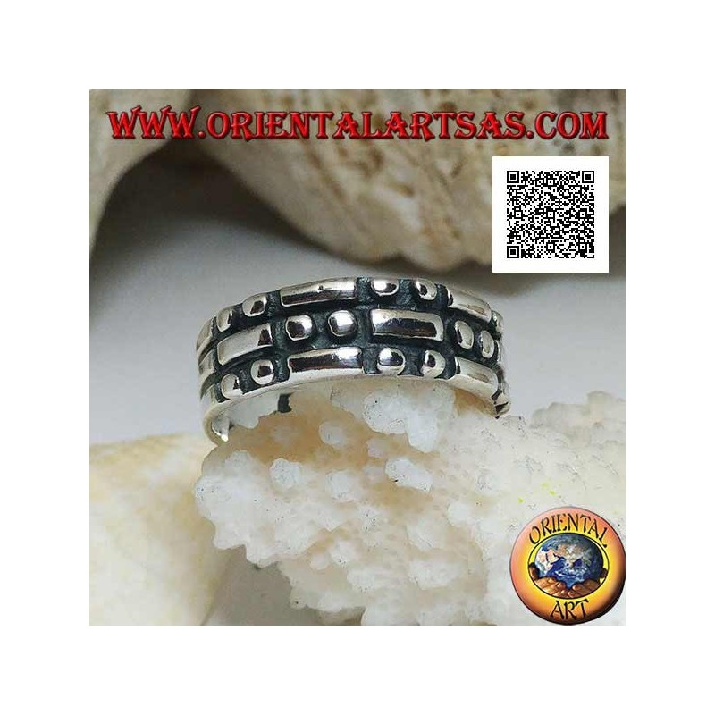 Silver ring with rectangles and pairs of checkerboard circles in bas-relief