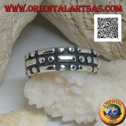 Silver ring with rectangles and pairs of checkerboard circles in bas-relief